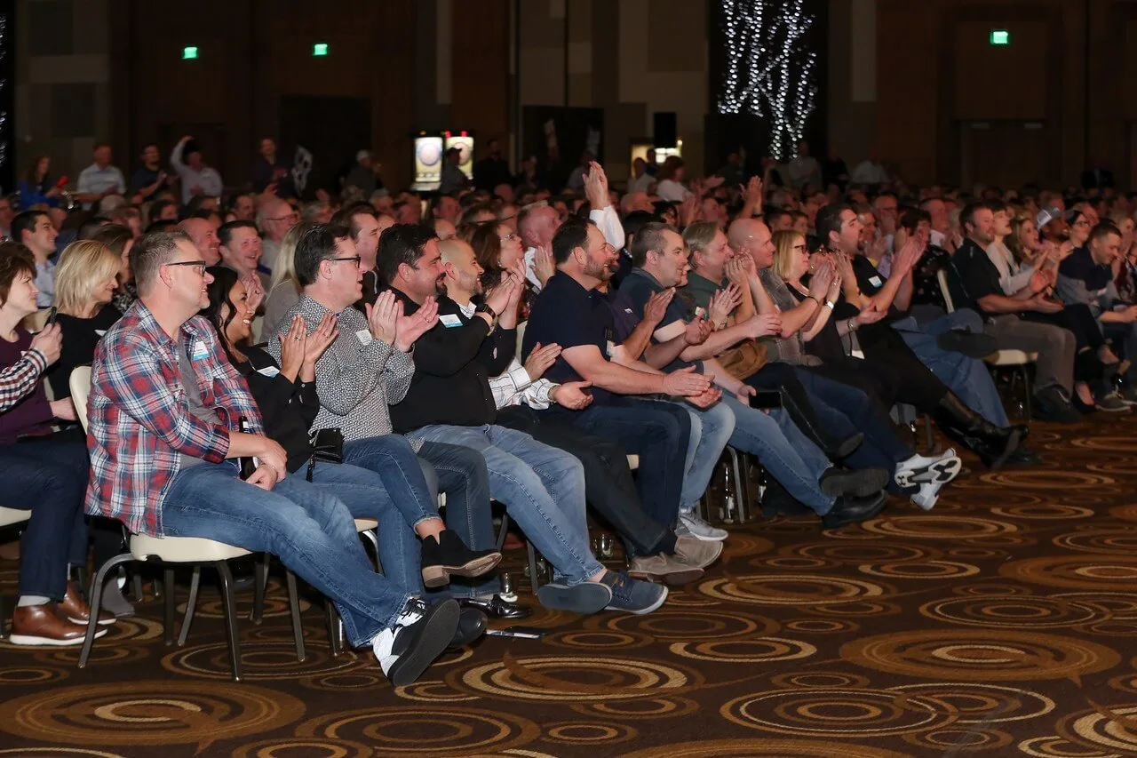 close up of crowd clapping